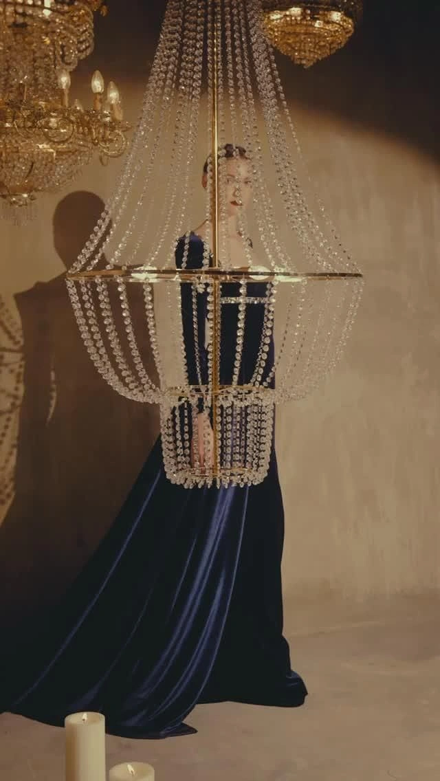 Lighting Stores & Lamps creative ad: Chandelier transformed into an unexpected fashion silhouette