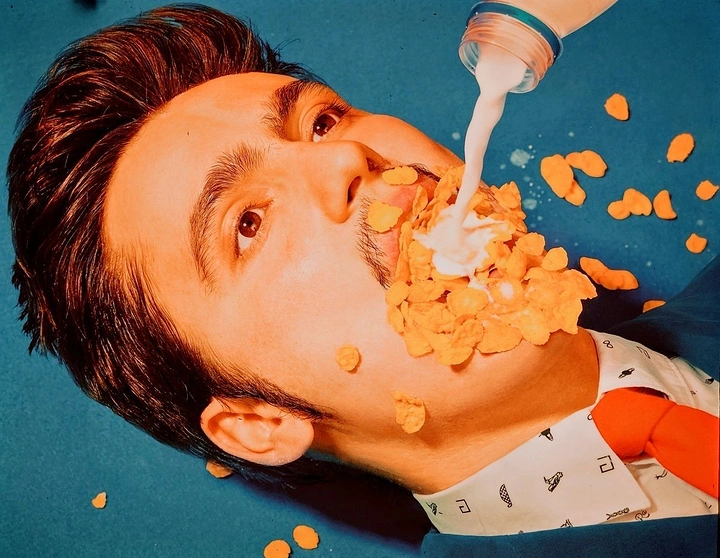 Breakfast Cereals & Oats creative ad: Human cereal explosion creates playful portrait