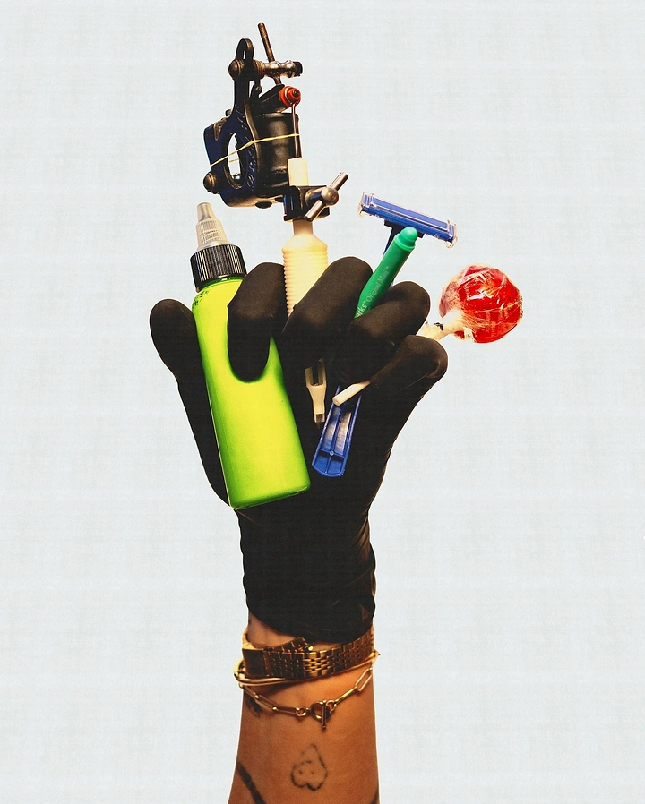 Tattoo Studios creative ad: Gloved fist bouquet of tattoo tools