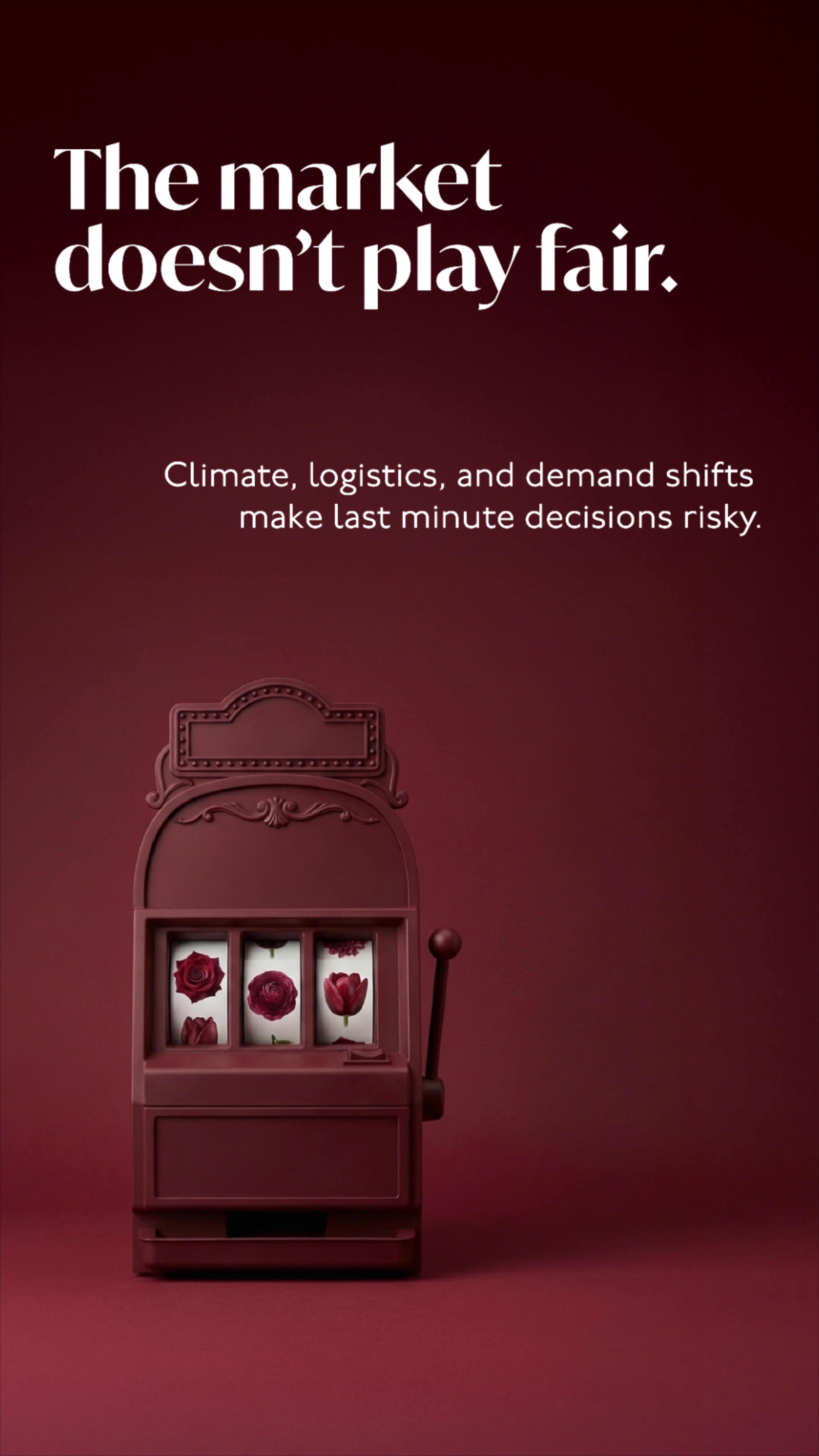 Burgundy claw-crane arcade machine filled with roses