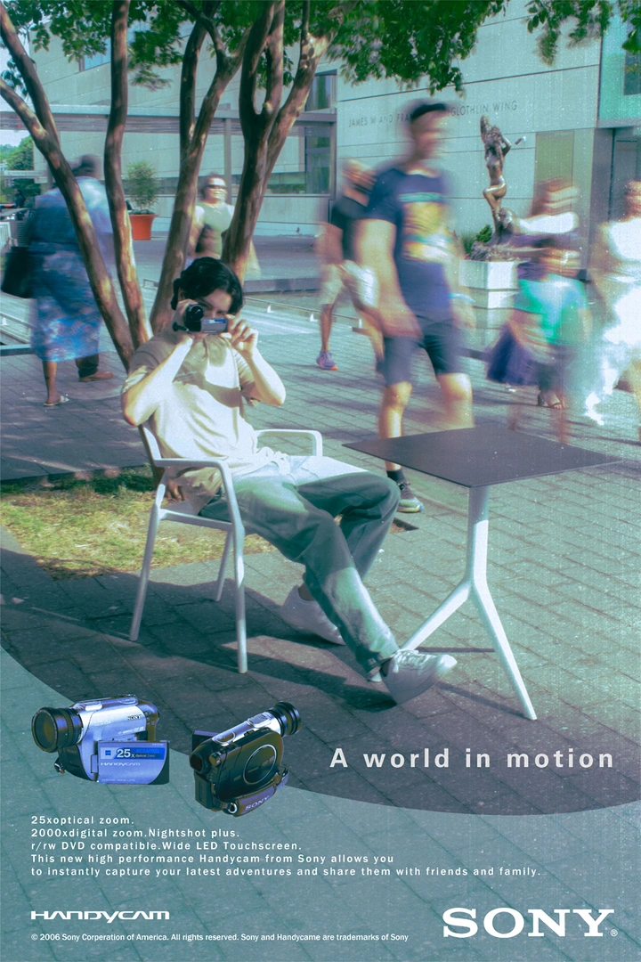 Photography creative ad: Still filmmaker amid motion-blur crowd, camcorder ad