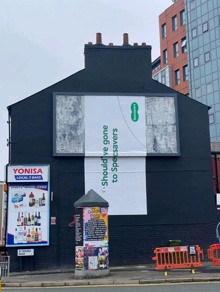 Home Renovation & Remodeling creative ad: Construction facade becomes bold ad surface