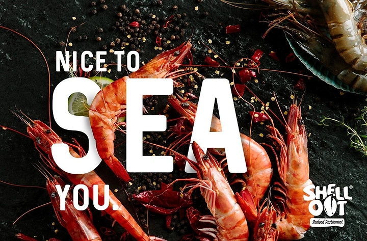 Seafood Restaurants creative ad: Seafood pun paired with dramatic platter
