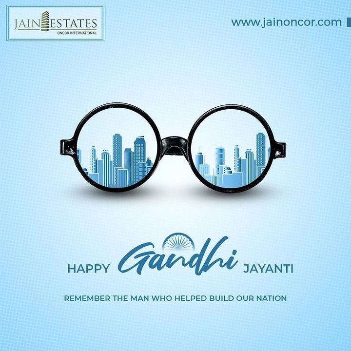 Gandhi Jayanti creative ad: Round Gandhi spectacles with a skyline seen in the lenses