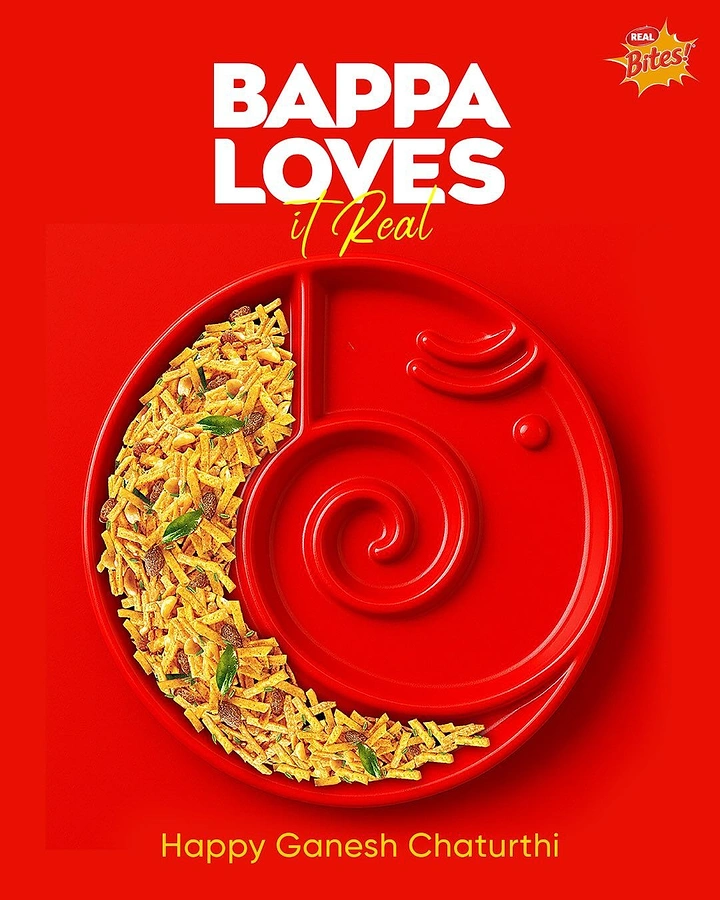 Ganesh Chaturthi creative ad: Red divided plate forming Ganesha face with namkeen