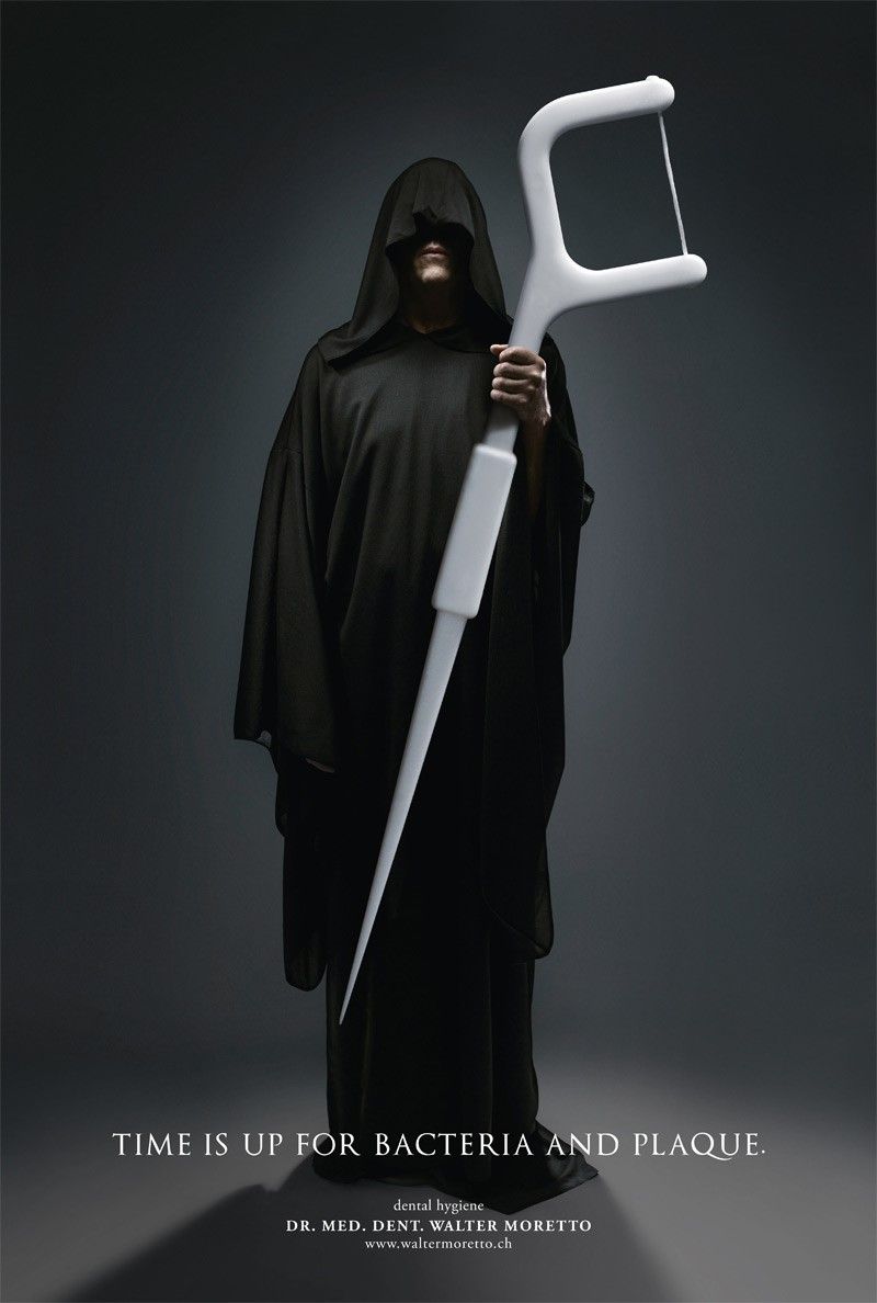 Poster: Hooded grim reaper holding a giant white dental floss pick like a scythe