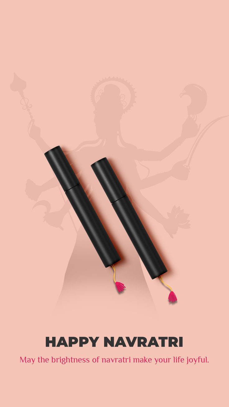Two black cosmetic tubes styled as dandiya sticks over a Durga silhouette