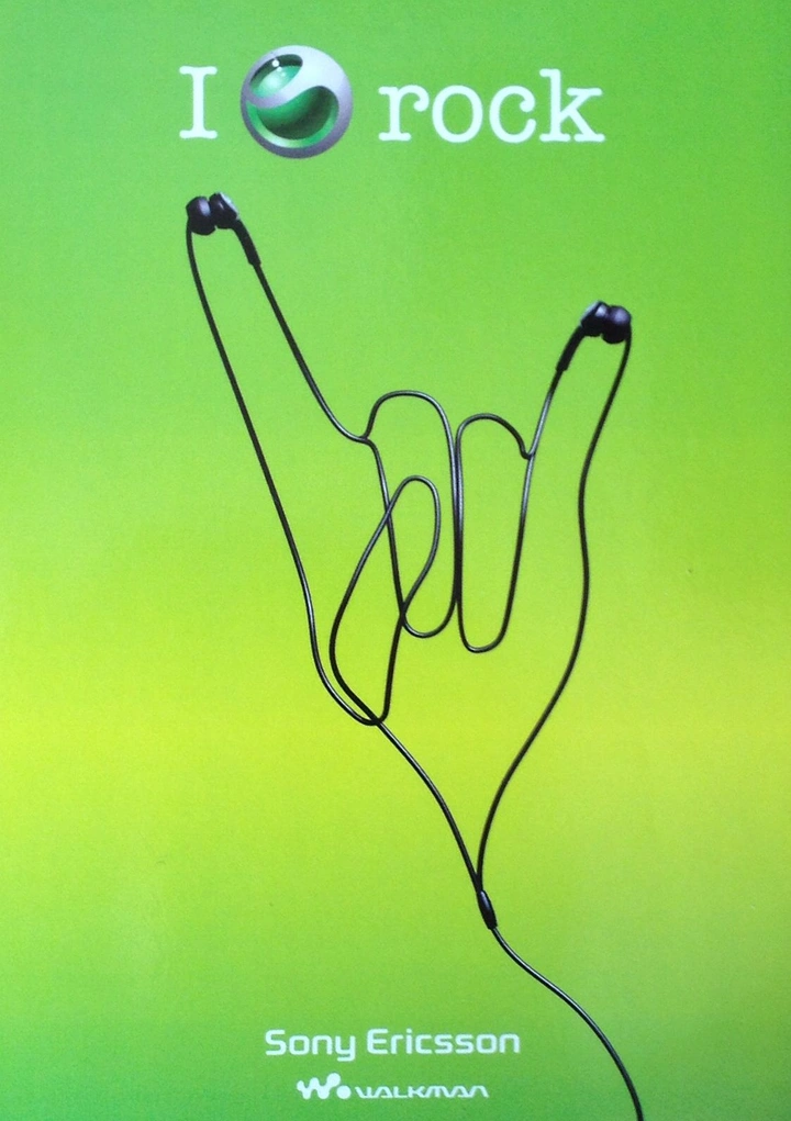 Electronics creative ad: Earphone cable shaped into a rock-on hand sign