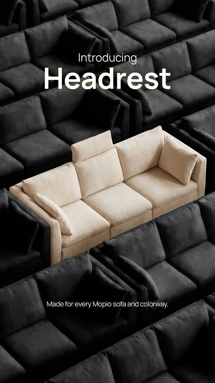 Creative ad: Cream sofa with headrest among rows of black sofas