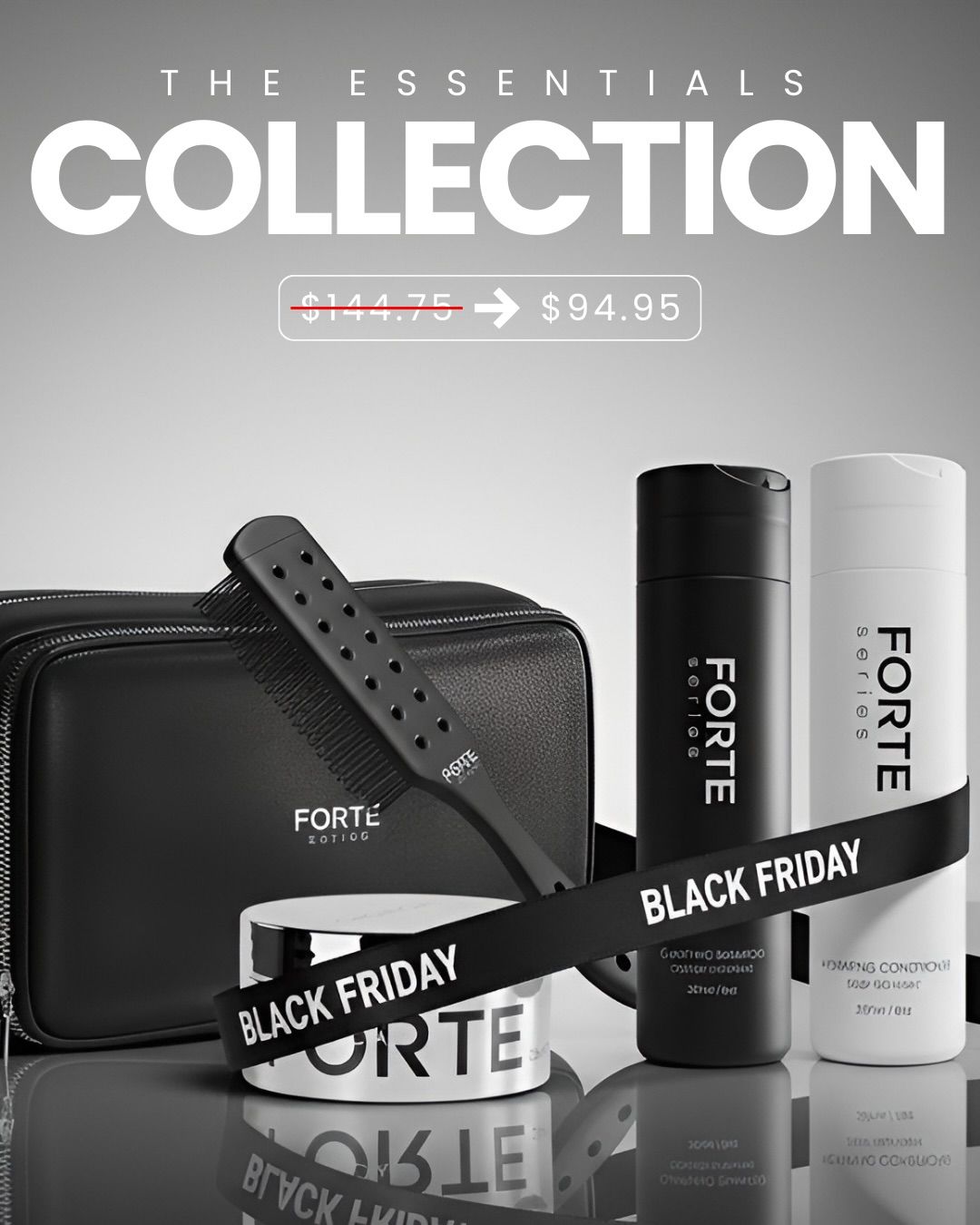 Haircare product bundle in a black pouch wrapped in branded silver ribbon
