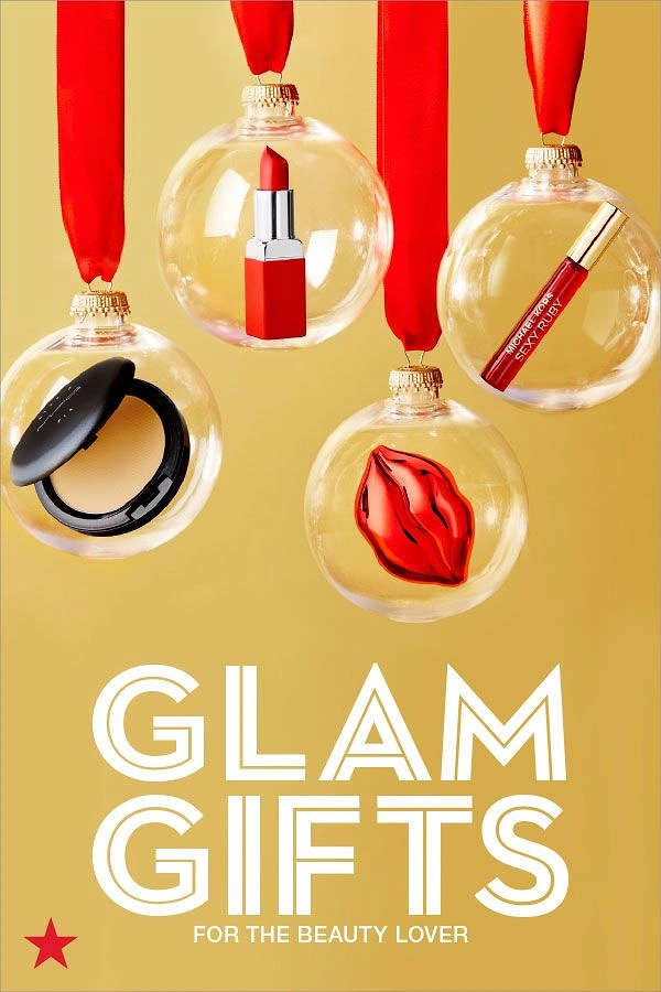 Christmas creative ad: Cosmetics inside clear hanging Christmas baubles