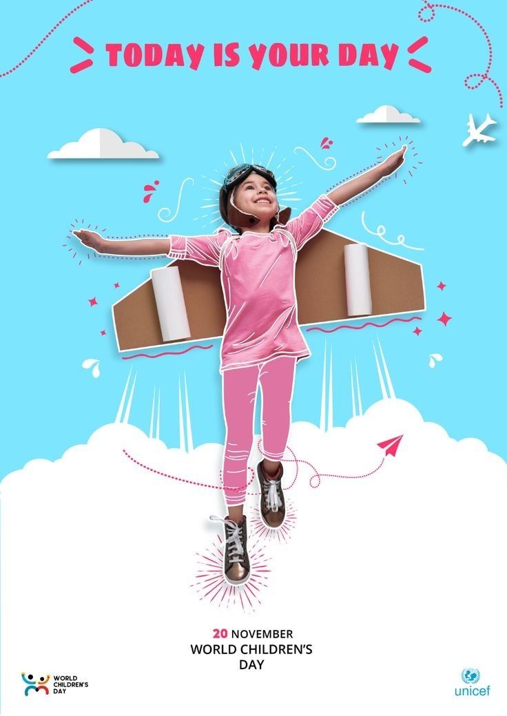 Girl flying with cardboard wings and aviator helmet