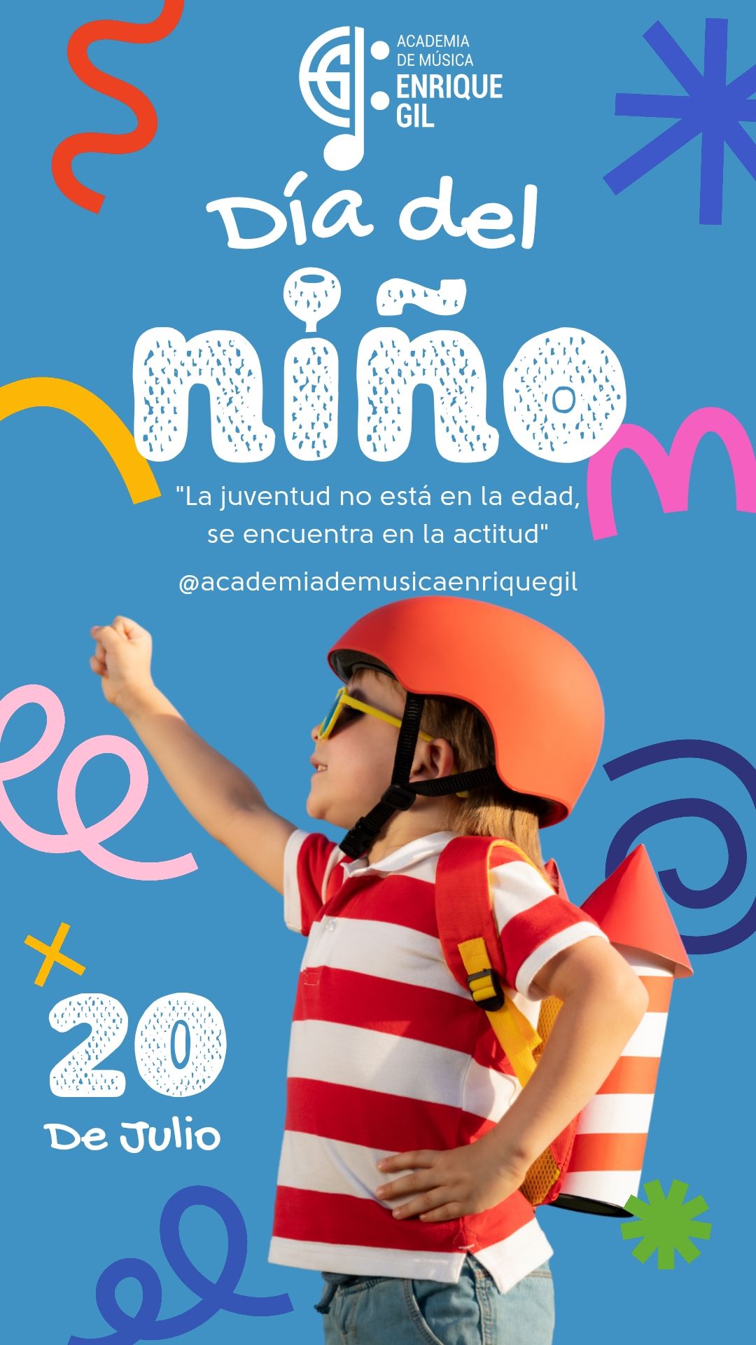 Child in helmet with cardboard rocket backpack posing like a superhero