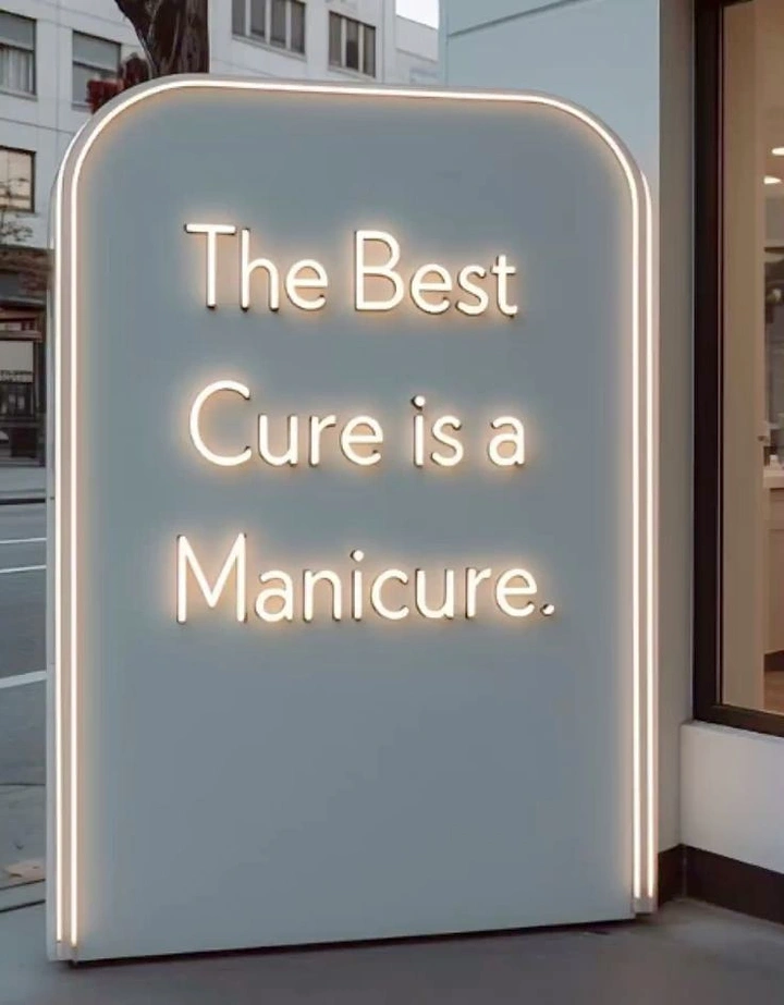 Nail Salons creative ad: Neon sign pun: best cure is manicure
