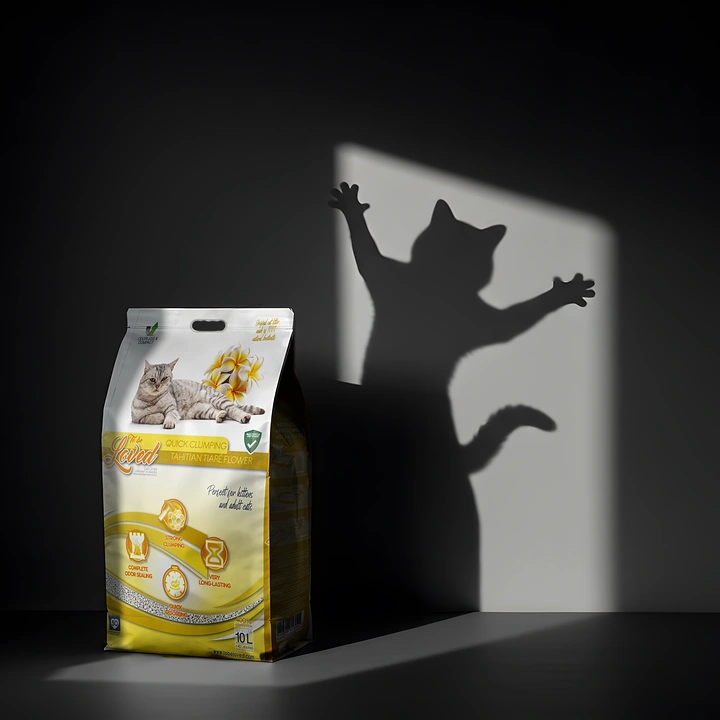 Pets creative ad: Cat litter bag casting a triumphant leaping cat-shaped shadow
