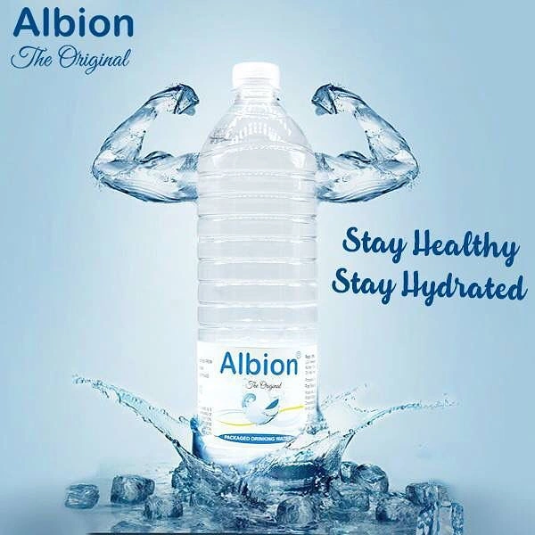 Packaged Drinking Water creative ad: Water streams create playful bottle framing