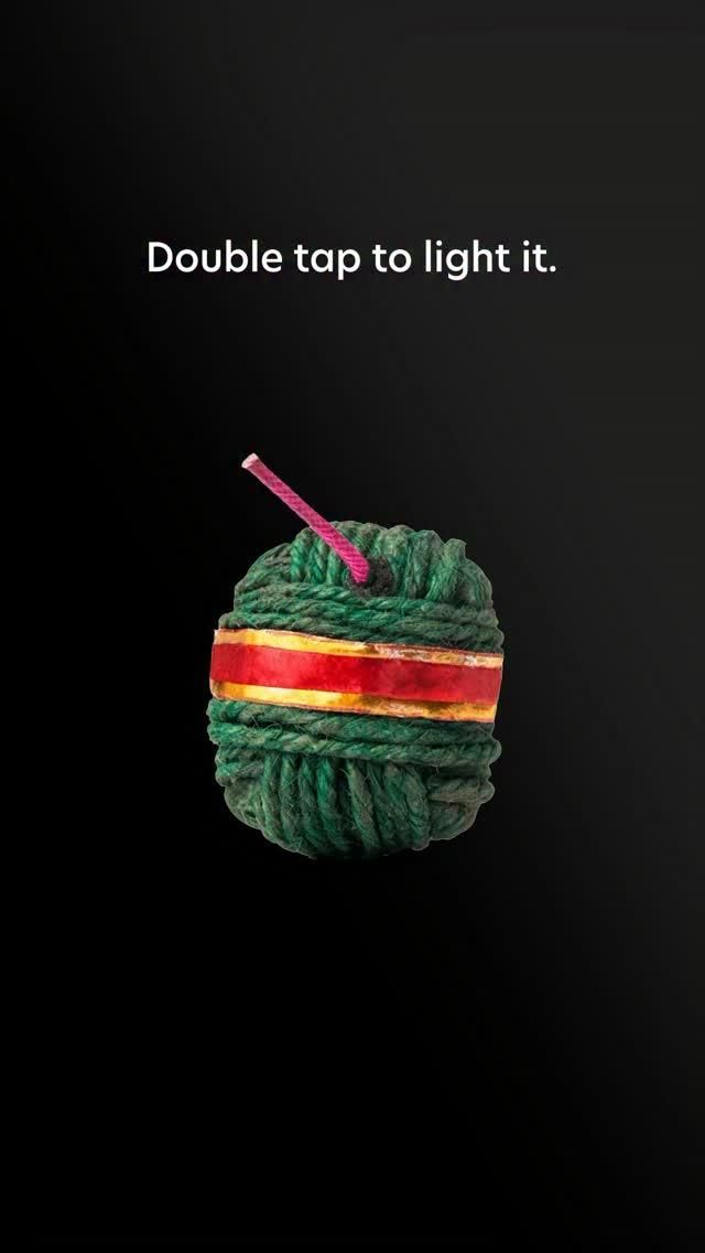 Green rope ball styled as a sutli bomb firecracker