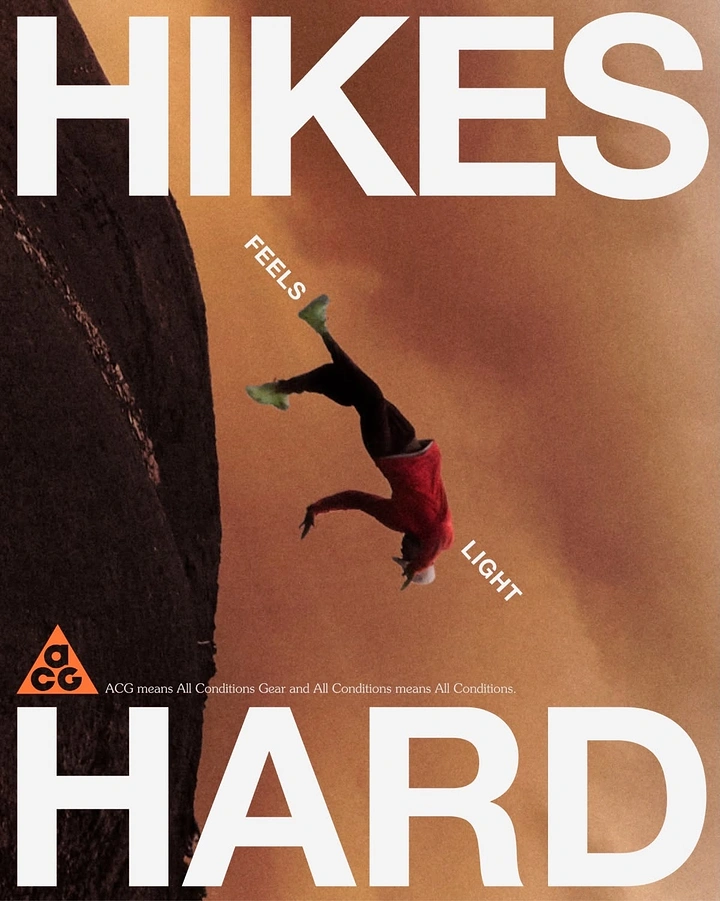Outdoor & Camping Gear creative ad: Figure in red flipping upside down beside a dark rock face in orange haze