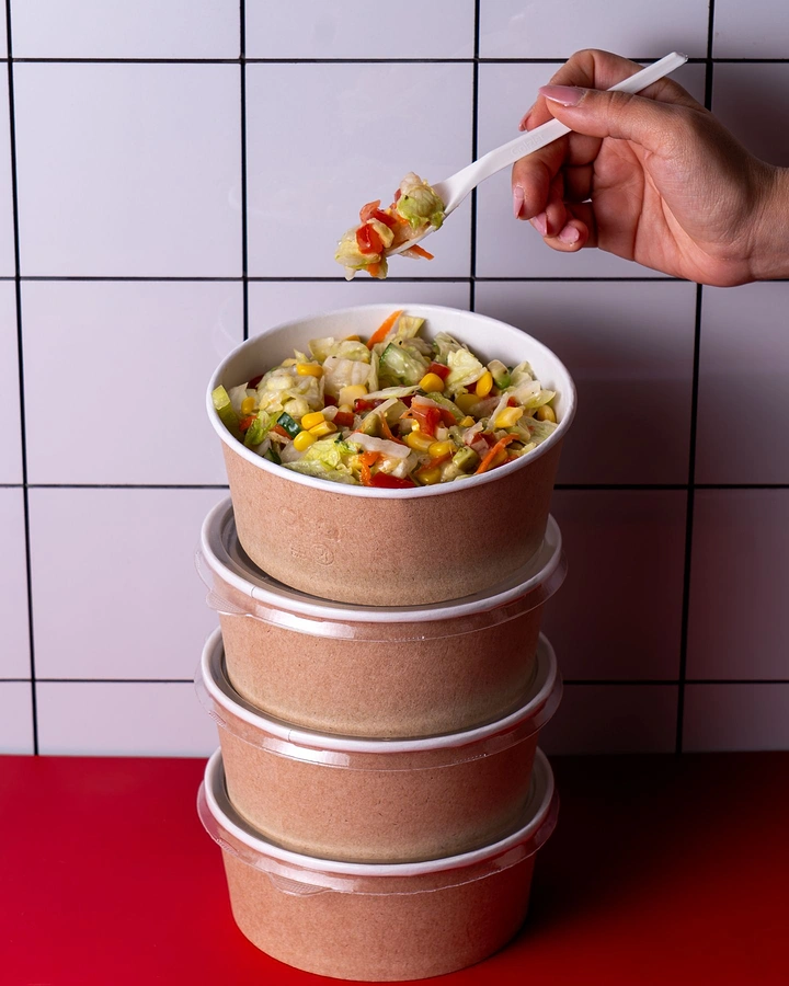Salad Bars & Healthy Restaurants creative ad: Unexpected stacked-bowl serving composition