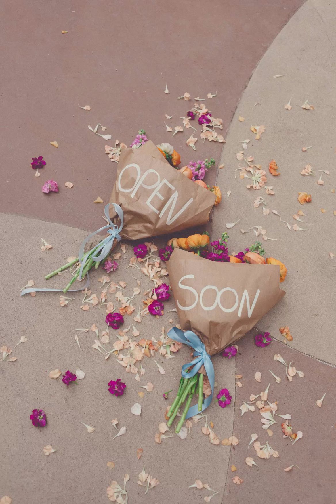 Kraft-wrapped bouquets spell 'Open Soon'