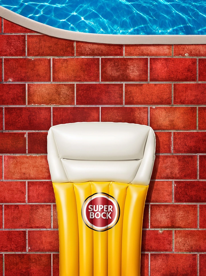 Creative ad: Yellow and white pool float shaped like a glass of beer