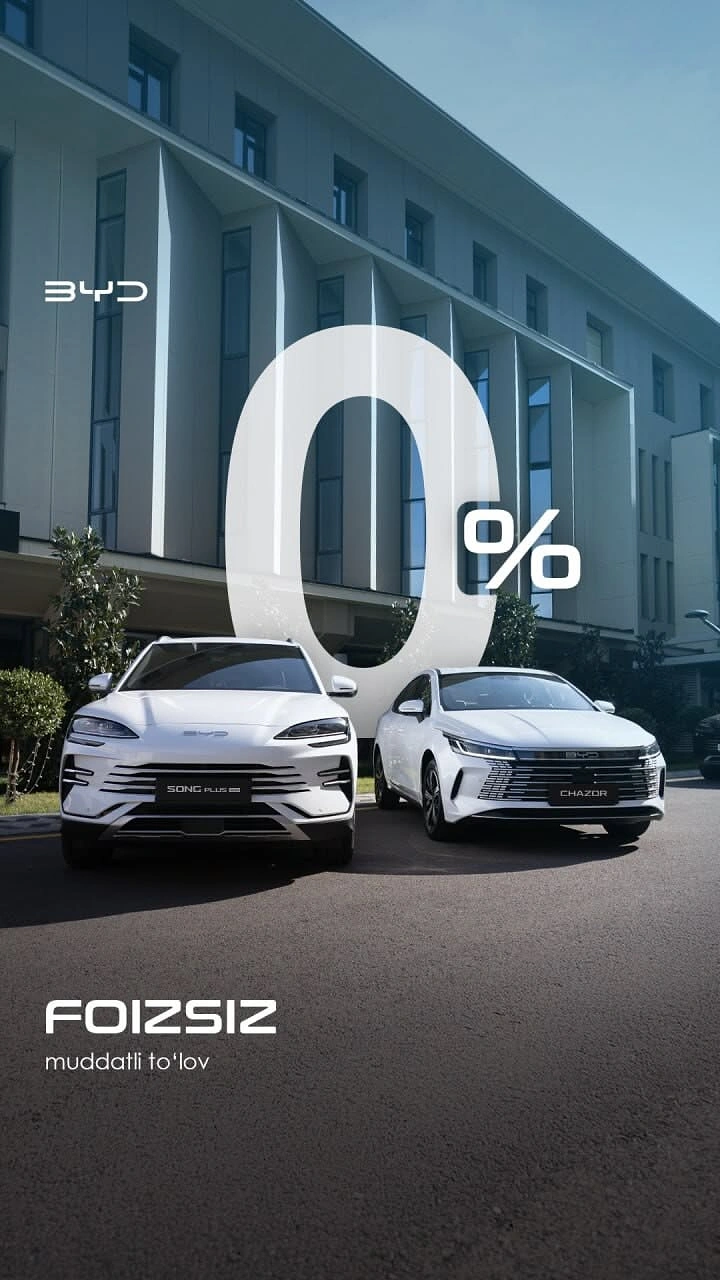Electric Vehicles creative ad: Two white cars parked in front of a modern white building with a giant 0%