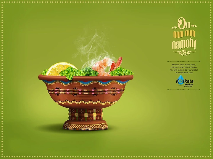 Durga Puja creative ad: Folk-painted clay pedestal bowl heaped with steaming food