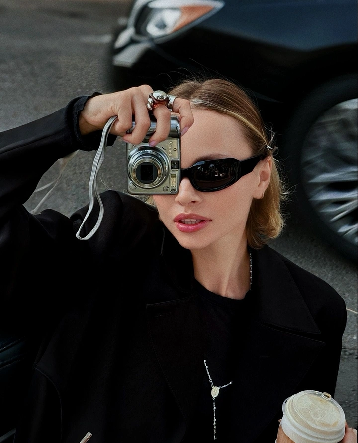 Cameras & Camera Stores creative ad: Camera styled as high-fashion accessory