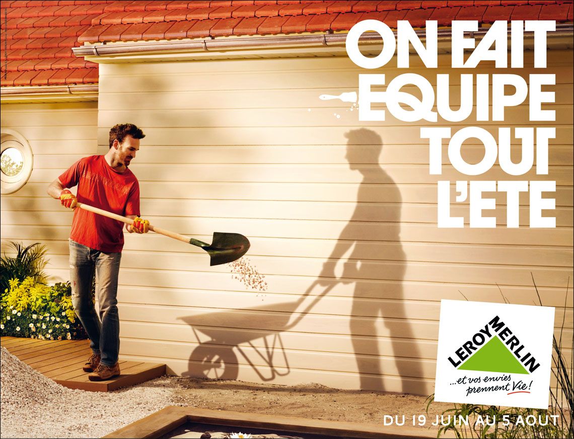 Banner: Man shoveling while his shadow pushes a wheelbarrow on a house wall