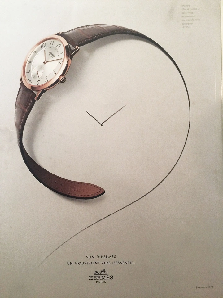 Creative ad: Rose-gold slim watch whose strap flows into a drawn spiral line with clock hands