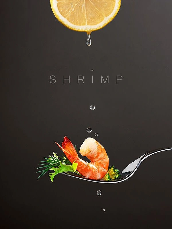 Seafood Restaurants creative ad: Unexpected suspended lemon and shrimp composition