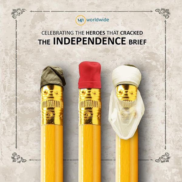 Three yellow pencils wearing leaders' caps and turban
