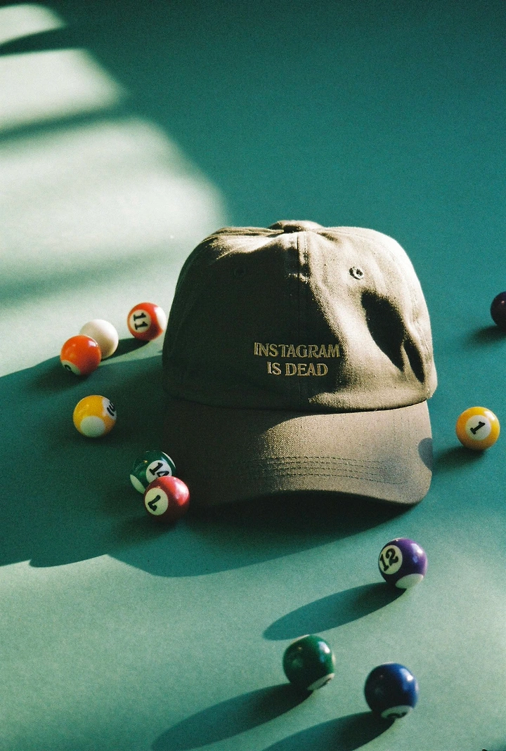 Hats & Caps creative ad: Billiard-ball scene supports witty cap message