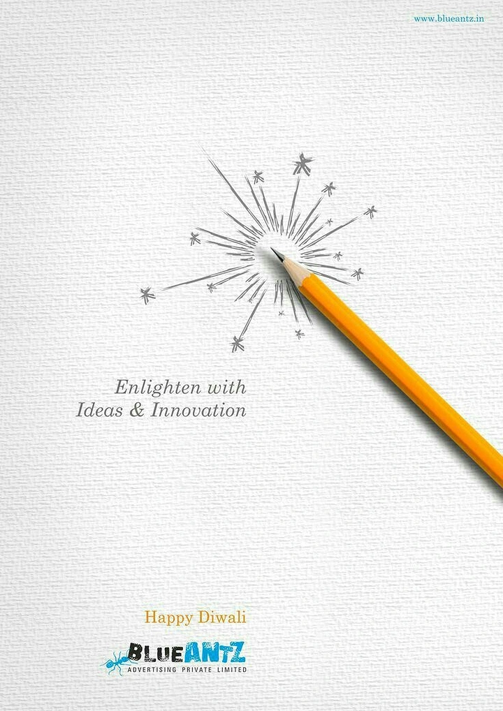 Diwali creative ad: Yellow pencil drawing a sparkler burst on paper