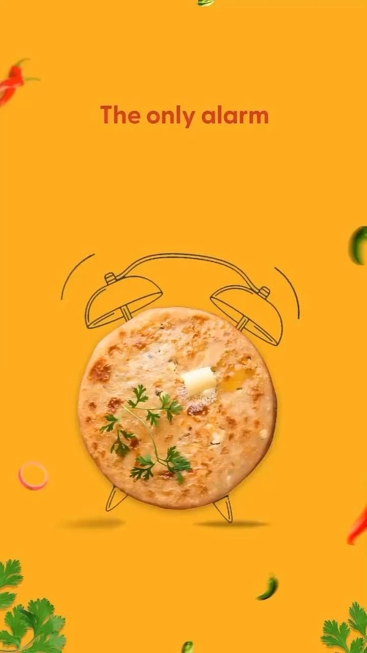 Cloud Kitchens & Food Trucks creative ad: Paratha as alarm clock face