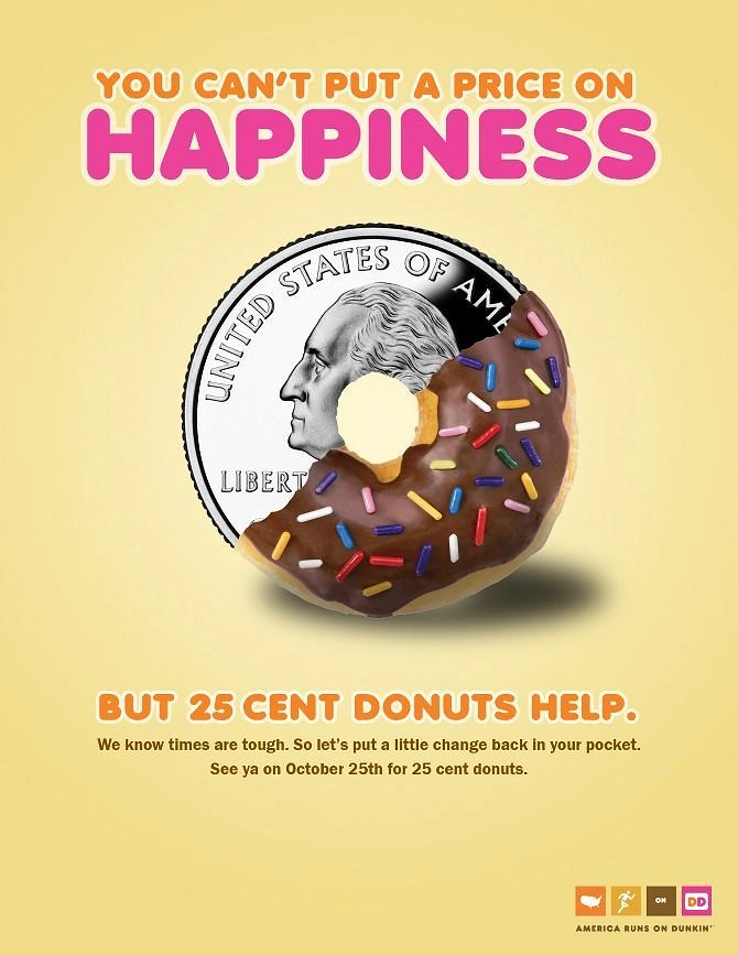 Donut Shops creative ad: Coin donut visual pun, strong offer