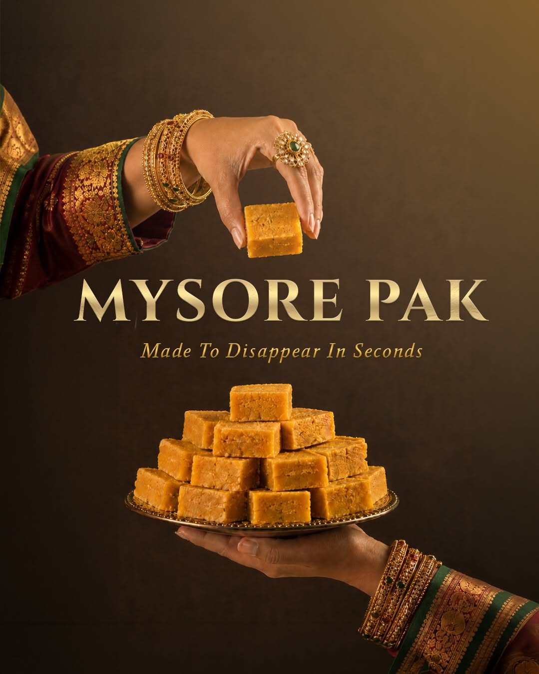 Instagram post: Adorned hands picking Mysore pak from a stacked plate