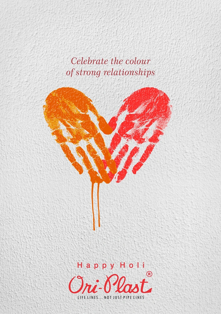 Holi creative ad: Two coloured handprints forming a heart