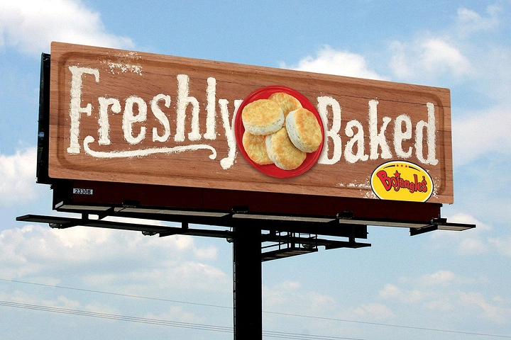 Cloud Kitchens & Food Trucks creative ad: Biscuits replace letters in Freshly Baked