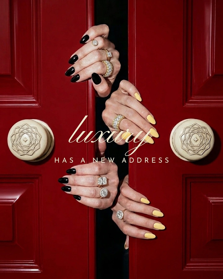 Creative ad: Ringed hands reaching through gap in red double doors