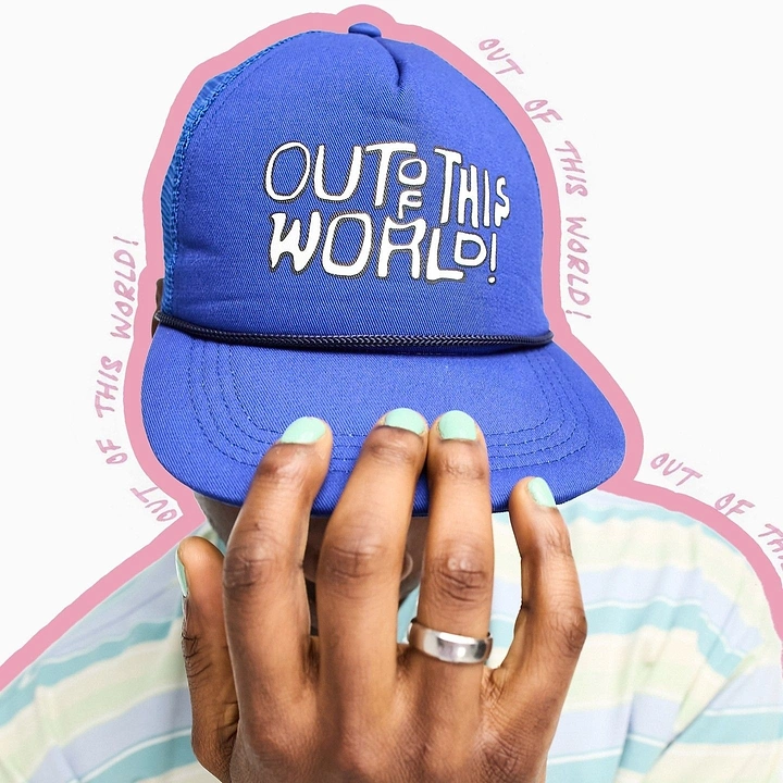 Hats & Caps creative ad: Hand lettering reinforces out-of-world idea