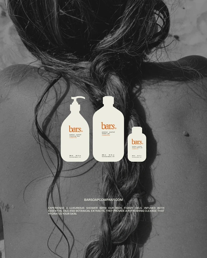 Beauty & Salon creative ad: Three shower-gel bottles floating over a black-and-white photo of a woman's bare back with a braid