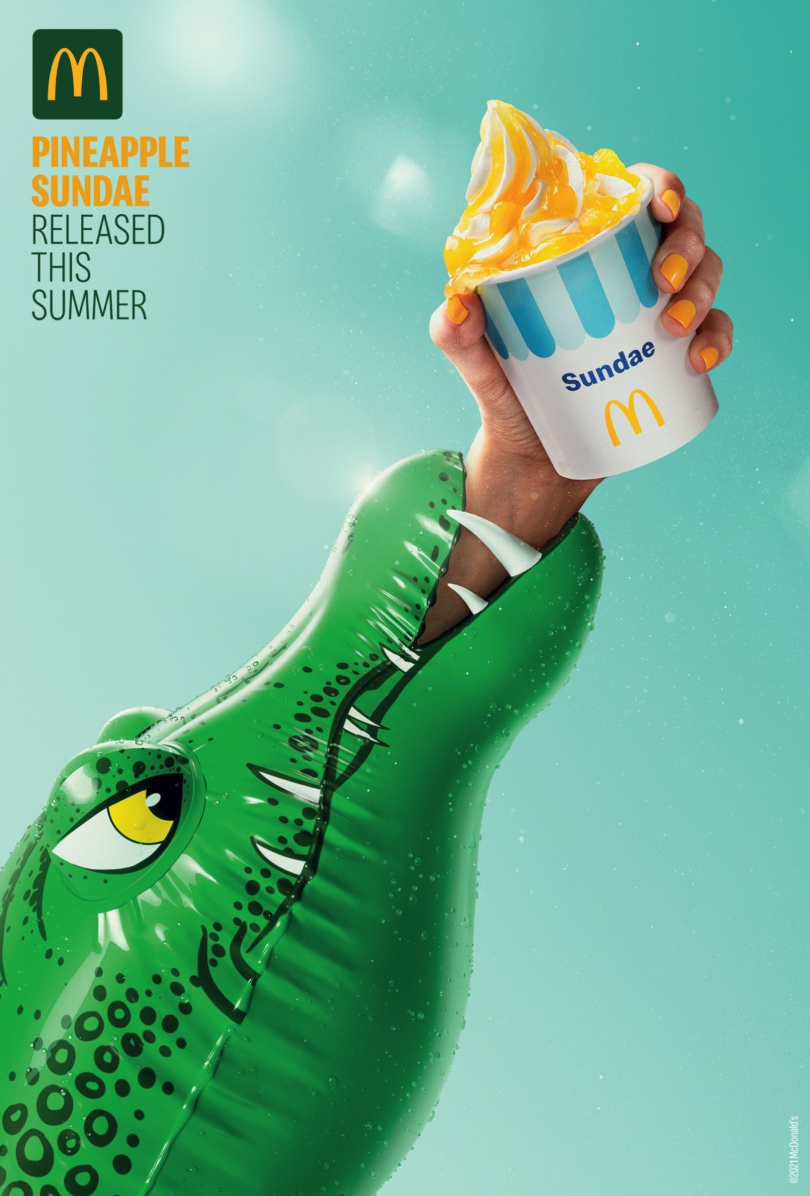 Poster: Hand emerging from inflatable crocodile's mouth holding a pineapple sundae