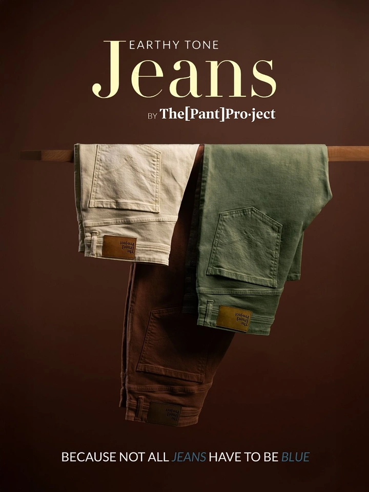 Creative ad: Three earthy-tone jeans draped over a wooden rail