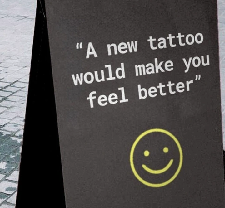 Tattoo Studios creative ad: Sidewalk sign with witty feel-better copy