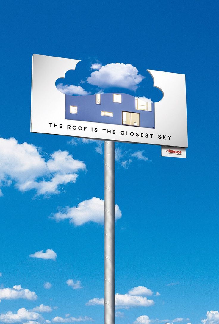 Poster: Billboard with a cloud-shaped cutout revealing a house under the sky