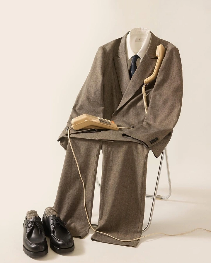 Men's Suits & Formal Wear creative ad: Empty suit becomes seated character