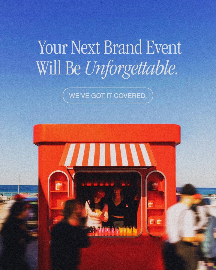 Creative ad: Red branded pop-up kiosk on a beachfront