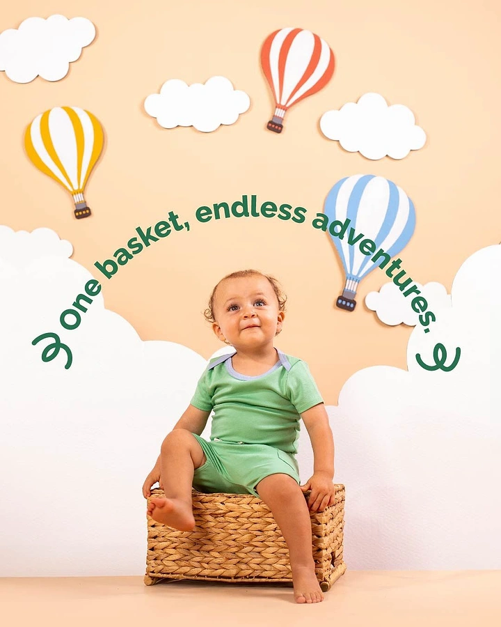 Kids Clothing creative ad: Basket becomes hot-air balloon adventure