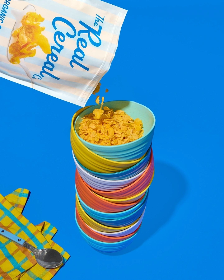 Breakfast Cereals & Oats creative ad: Stacked bowls create playful product tower